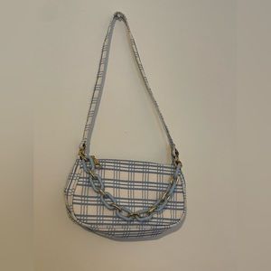 Blue and white checkered bag